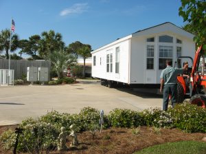 Backing a Park Model into a RV lot. We took the wheels off so it could be lower and they anchored it down for a permanent fix.